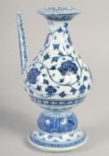A CHINESE BLUE AND WHITE PORCELAIN EWER, bearing six-character mark, 22cm high.
