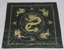 A 20TH CENTURY CHINESE SILK TABLECLOTH, with metal threaded dragons, 143cm x 130cm.