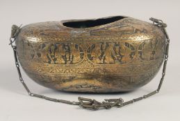 A FINE 19TH CENTURY PERSIAN QAJAR BRASS KASHKOOL, engraved and chased with panels of figures, 25cm