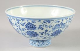 A CHINESE BLUE AND WHITE PORCELAIN FOOTED BOWL, decorated with lucky symbols and lotus, six-