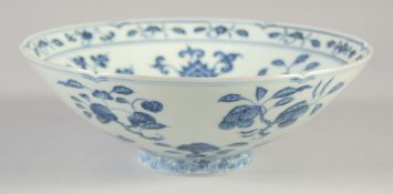 A CHINESE BLUE AND WHITE PORCELAIN BOWL, painted with various fruits and flowers, six-character mark