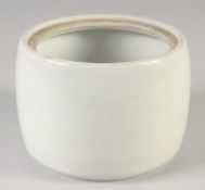 A CHINESE WHITE GLAZED CHESS POT, with incised phoenix, (lacking cover), 13cm diameter.