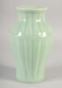 A CHINESE CELADON GLAZE PORCELAIN VASE, with six-character mark to base, 23cm high.