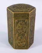 A 19TH CENTURY QAJAR ENGRAVED BRASS HEXAGONAL BOX, with decoration of floral motif, 12.5cm high.