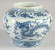 A CHINESE BLUE AND WHITE PORCELAIN DRAGON JAR, 12.5cm high.