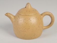 A SMALL CHINESE YIXING TEAPOT, impressed trade mark to base, 12cm spout to handle.