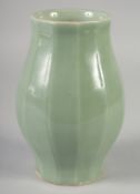 A CHINESE CELADON VASE, 20cm high.