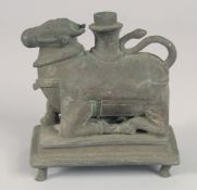 AN 18TH CENTURY SOUTH INDIAN BRONZE NANDI BULL, 11cm long.