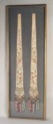 A 19TH CENTURY PAIR OF CHINESE SILK ACCESSORIES, framed and glazed together, frame 113cm x 37cm.