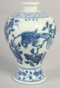 A CHINESE BLUE AND WHITE PORCELAIN MEIPING VASE, with birds and flora, bearing four-character