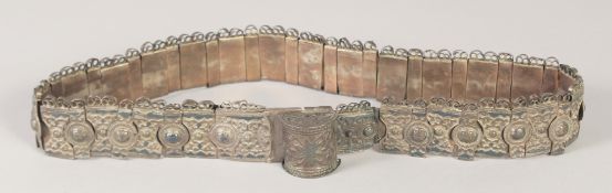A 19TH CENTURY OTTOMAN TURKISH NIELLO AND LOW GRADE SILVER BELT, 76cm long.