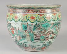 A 19TH CENTURY CHINESE FAMILLE VERTE PORCELAIN JARDINIERE, painted with warriors on horseback and