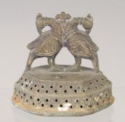 A 19TH CENTURY INDIAN BRASS FOOT SCRAPER, 8.5cm wide.