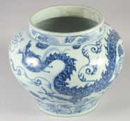 A LARGE CHINESE BLUE AND WHITE PORCELAIN JARDINIERE, decoration with a dragon and stylised clouds,