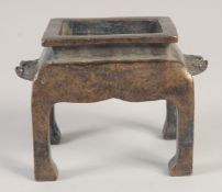 A GOOD CHINESE CENSER on four legs. 4ins high.