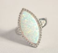 A SILVER GILSON OPAL RING.