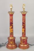 A PAIR OF RED TOLEWARE CHINESE DESIGN LAMPS. 24ins high.