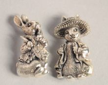 TWO NOVELTY CAST SILVER BEATRIX POTTER RABBIT BROOCHES.