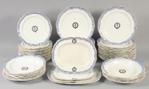 A GOOD ARMORIAL DANIEL PORCELAIN PART DINNER SERVICE with blue and gilt crest, 