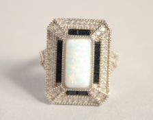 A SILVER DECO STYLE OPAL RING.
