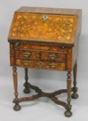 A GOOD SMALL 18TH CENTURY ENGLISH MARQUETRY BUREAU on a stand with fall front and fitted interior