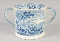 A STAFFORDSHIRE TWO HANDLED LOVING CUP printed with a farm scene