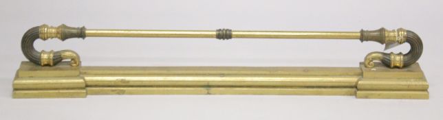 A REGENCY BRASS AND BRONZE FENDER FRONT. 3ft 5ins long, 4ins deep.