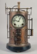 A BRONZE CYLINDER INDUSTRIAL CLOCK with cream dial. 16ins high.