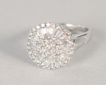 A SUPERB 18K GOLD DIAMOND CIRCULAR RING.