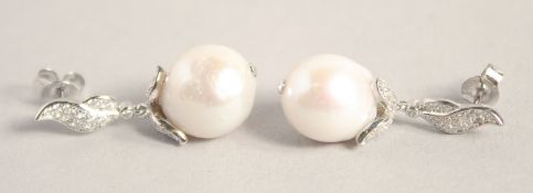 A PAIR OF SILVER BAROQUE PEARL EARRINGS.