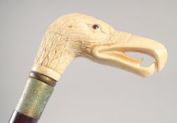 A WALKING STICK with carved bone handle 