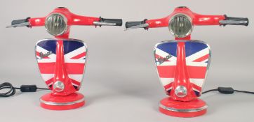 A PAIR OF RED UNION JACK VESPA LAMPS. 13ins high.