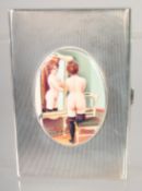 A GOOD LARGE HEAVY ENGINE TURNED CIGARETTE CASE with and oval enamel of a nude. 4.75ins x 3.25ins.