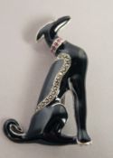 A SILVER ART DECO STYLE RUBY SET GREYHOUND BROOCH.