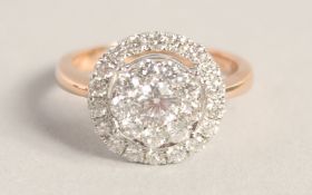 A SUPERB 18CT GOLD ROUND DIAMOND RING.