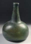 A MID 17TH CENTURY DUTCH GREEN GLASS ONION BOTTLE, deep painted base.