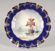 A ROYAL CROWN DERBY FINE SCALLOPED EDGE PLATE painted in colour with a ship at anchor and a castle