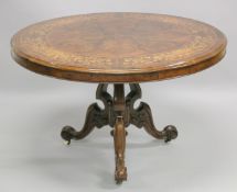 A GOOD VICTORIAN FIGURED WALNUT AND MARQUETRY CIRCULAR LOO DINING TABLE with quartered marquetry top