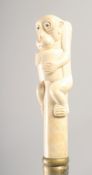 A WALKING STICK with carved bone handle 