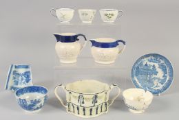 A 19TH CENTURY STAFFORDSHIRE POTTERY JUG with applied decoration and blue band and another