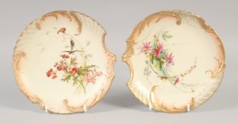 A ROYAL WORCESTER TWO BLUSH SHELL SHAPED PLATES painted in the manner of Edward Raby date 1902 &