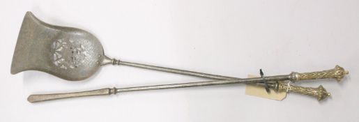 A PAIR OF STEEL FIRE IRONS.