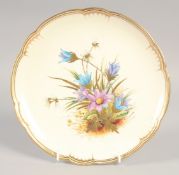 A ROYAL CROWN DERBY COMPORT painted with flowers and raised gold and platinum leaves, circa. 18810.