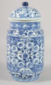 A CHINESE BLUE AND WHITE PORCELAIN CYLINDRICAL JAR AND COVER, decorated with various floral