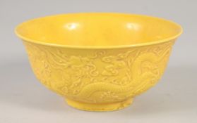 A CHINESE YELLOW PORCELAIN DRAGON BOWL 6ins diameter.