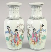 A PAIR OF REPUBLIC PORCELAIN VASES painted with girls. 8ins high.