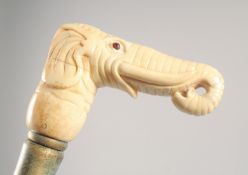 A WALKING STICK with carved bone handle 