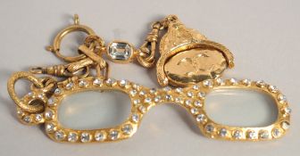 A PAIR OF GILT METAL CHANEL LORGNETTES.