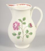 AN 18TH CENTURY WORCESTER JUG painted with a rose and rose bud with internal line and loop border.