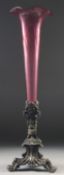 A 19TH CENTURY TALL TAPERING GLASS CENTREPIECE with cast metal base. 24ins high.